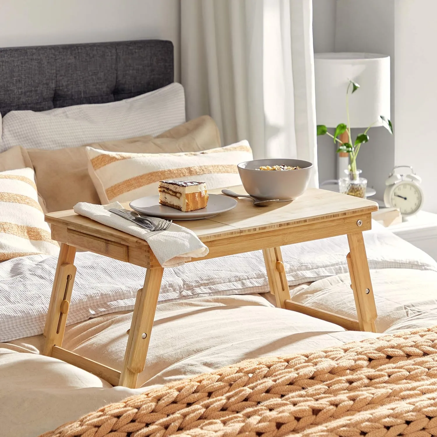 SONGMICS Laptop Desk for Bed or Sofa with Tilting Top, Breakfast Serving Tray with Folding Legs, Fits up to 15.6 Inches Screen, (24-26.9) x 13.7 x (8.8-12.6) Inches, Natural ULLD01N